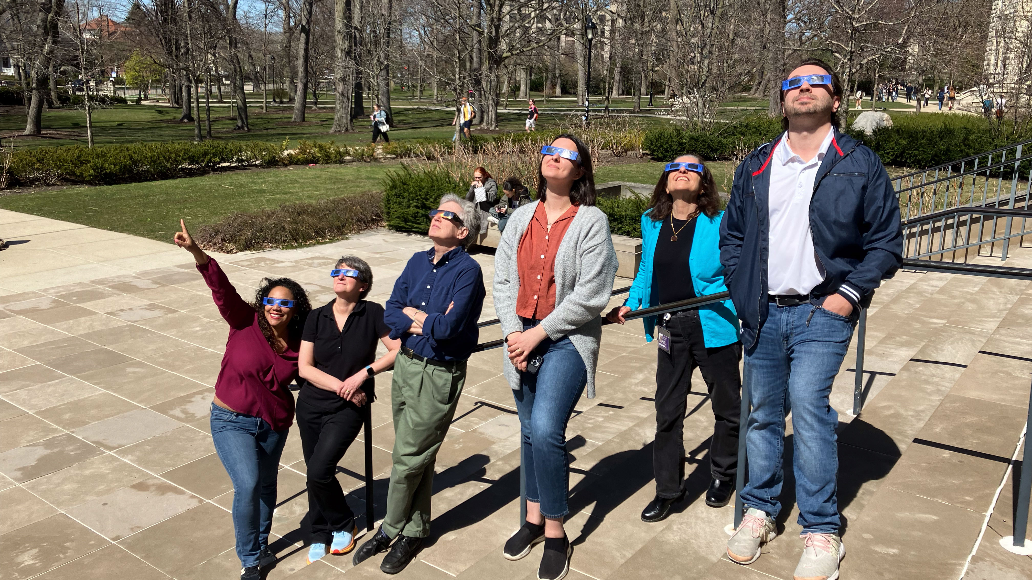 staff watching the eclipse